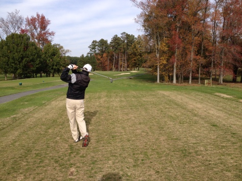 Teeing off on the par-3, 17th at Hog Neck